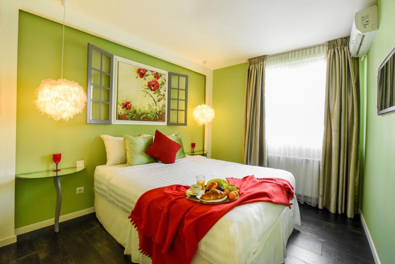 Downtown Oasis: Central Apartments With Cozy Charm ブカレスト エクステリア 写真